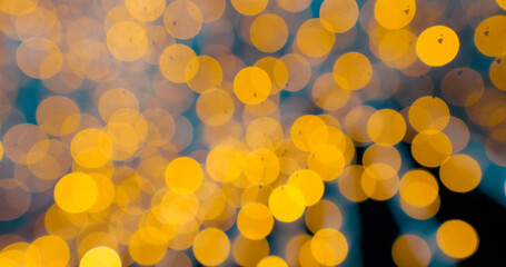 Abstract moving background with Christmas defocused lights Glittering bokeh background. Shimmering...