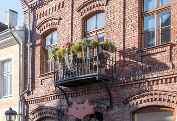 facade of the old building with balcony