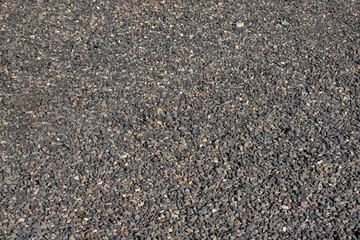 texture of gravel stones on ground background	