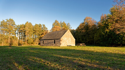 Hairy Nicols Cottage at the Far end of Crombie Park and Reservoir, near to Dundee on a late sunny afternoon in October.