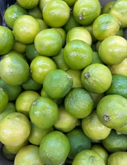 Green fresh limes top view