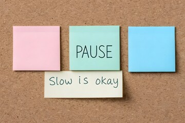 Sticky notes with messages arranged on corkboard background