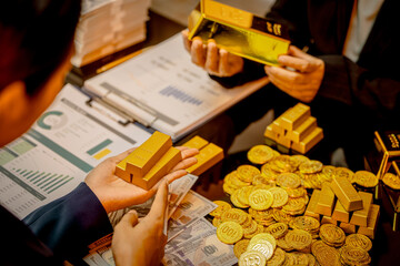A suited Asian analyst confirms the tangible value of global gold holdings, carefully placing a 999.9 fine gold bar amidst a reflective display of physical assets.