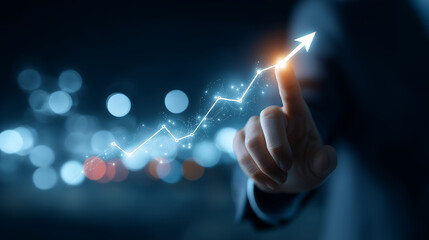 A businessman's hand touches a virtual financial graph with a rising arrow, set against a blue night-time background