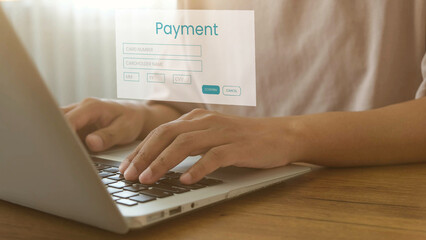 Online payment form on laptop screen with hands typing, digital finance concept