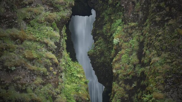 the waterfall and mountain in Iceland