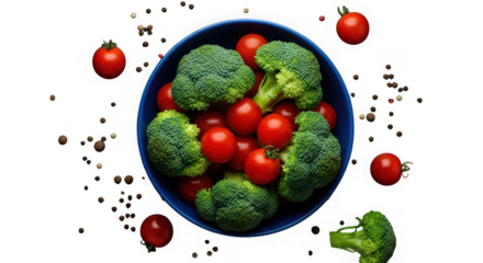Fresh broccoli and cherry tomatoes in a blue bowl with peppercorns scattered around, isolated on transparent background