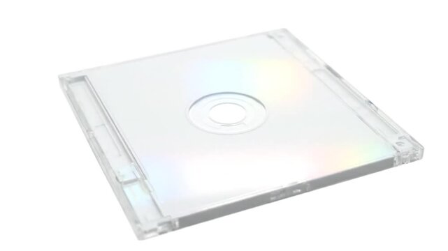 Clear plastic jewel case with a compact disc inside, showing faint rainbow reflections on a white background