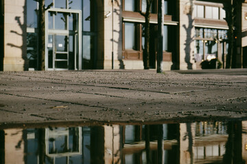 Close up of a puddle in city