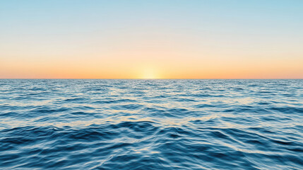 Obraz premium Serene ocean waves reflect pastel colors at sunset, creating tranquil atmosphere