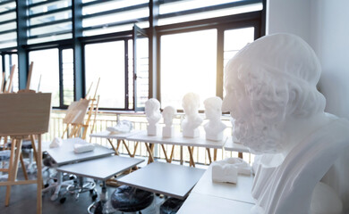 School art room with easels and sculptures