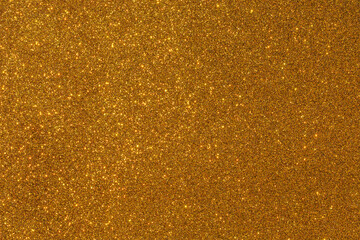 A gold background with a lot of glitter