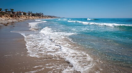 Fototapeta premium North Carlsbad Beach: Scenic Coastal Escape with Golden Sand and Crystal Blue Waters Under a Summer Sky