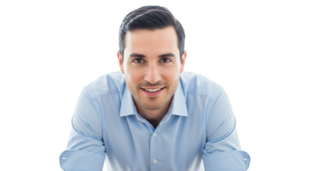 A smiling and cheerful man in a light blue shirt looks directly at the camera. He exudes confidence and sincerity.