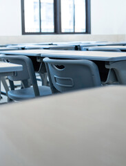 Tables and chairs in the school classroom