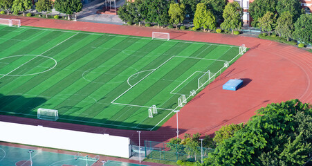 Aerial view of school soccer field and basketball court