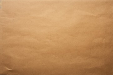 Obraz premium Crumpled brown wrapping paper texture provides a simple yet versatile background