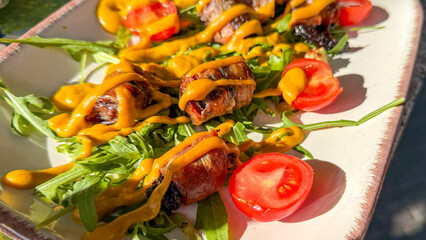 Roasted date delicacy with turmeric drizzle on rocket bed, savor Ottoman feast or romantic Slow Food Movement gathering