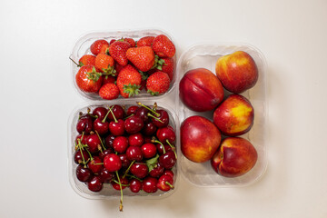 Fresh summer symphony: vibrant strawberries, cherries, and nectarines evoke midsummer solstice feasts and tantalizing taste explorations