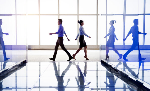 Business people walking in the hallway