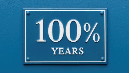 Blue house number sign displaying the white digits 100, symbolizing a centennial celebration