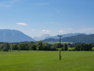 Freilassing, Germany - July 26th 2024: Beautiful landscape in the foot hills of the Alps towards the Watzmann massif.