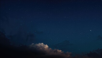 Fototapeta premium Stunning digital artwork of a star-filled night landscape with clouds and glowing blue light