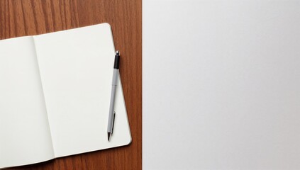 Blank notebook and pen resting on a rustic wooden table with ample empty space to the right