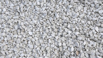 Texture background of white crushed gravel stones with sharp edges