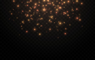 Golden glowing magic dust on a transparent background. Flying light particles PNG. Glowing dust PNG.