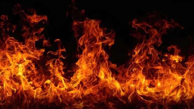 Isolated fiery blaze against dark backdrop. Abstract flame texture and burning pattern design.