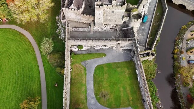 Stunning 4K 60fps drone footage showcasing Cahir Castle, one of Ireland&rsquo;s best-preserved medieval fortresses, surrounded by lush greenery and the flowing River Suir. The video captures the historic ar