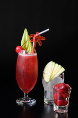 A Refreshing drink presented on the table with fruit decorations