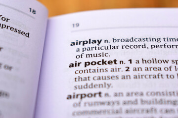 Obraz premium Close Up Of English Dictionary Page With Word - air pocket