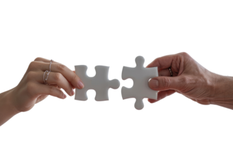 Hands connecting two white jigsaw puzzle pieces for a teamwork solution isolated on transparent white background 