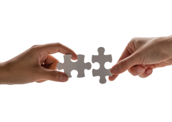 Hands connecting two white jigsaw puzzle pieces for a teamwork solution isolated on transparent white background 