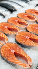 Fresh salmon steaks on ice display at seafood market