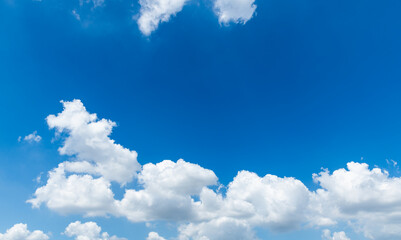 Background of blue sky with some white clouds