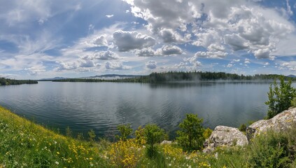 Springtime panoramic view of alpine lakes