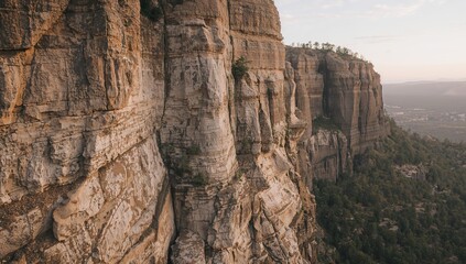 Vertical Formation Layers of Time Carved in Stone, a Cliffside Drama Under Gentle Light.