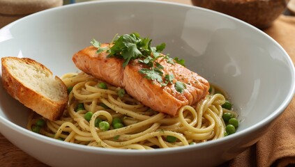 Linguine noodles served with salmon, garden cress, and fresh peas