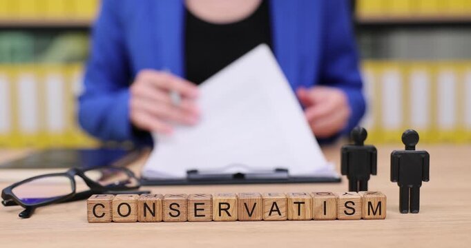 Exploring conservatism through thoughtful analysis and discussion in a modern workspace