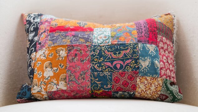 Beautiful patchwork pillow crafted with care. A cherished pillow from my grandmother.