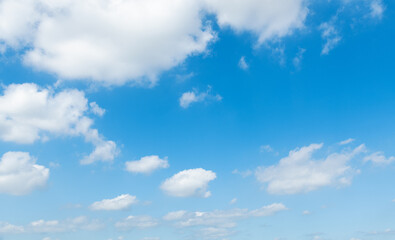Background of blue sky with some white clouds