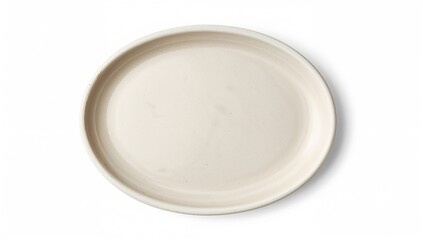 Empty beige ceramic dish with an oval shape on a white backdrop. Contemporary pottery, porcelain, or clay tableware seen from above.