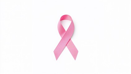 Single pink ribbon symbolizing breast cancer awareness and healthcare, isolated with copy space.