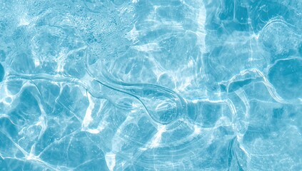 Abstract blue summer backdrop with transparent water texture featuring ripples and splashes. Sunlit water waves from a top perspective with copy space. Skincare products like moisturizer, micellar