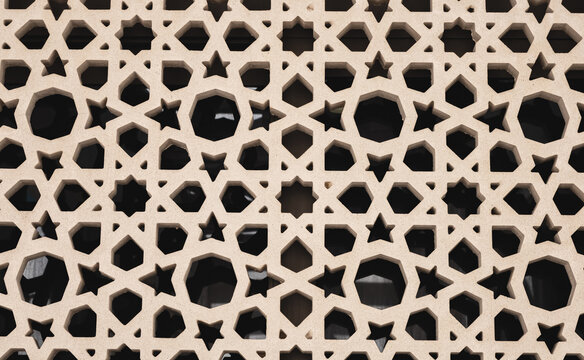 Sandstone decoration pattern jali background. Carved sandstone window in jali pattern