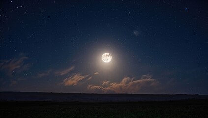 Moonlit night under a star-filled sky