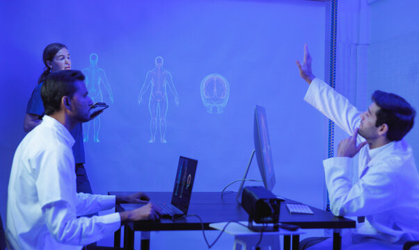 Male and female surgeons analyze images with futuristic holographic technology, plan high-tech surgical strategies, and prepare for collaboration. - Powered by Adobe